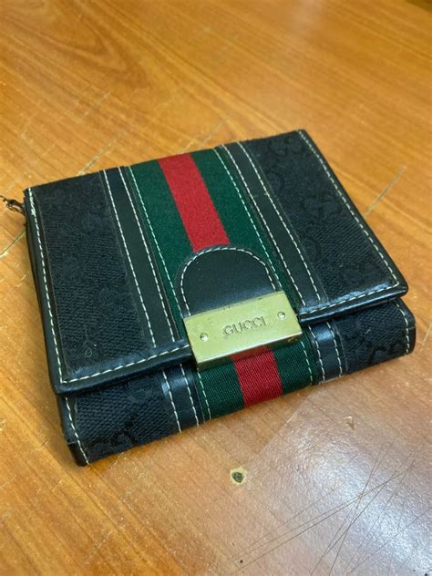 hand of gucci wallet|fake Gucci wallet.